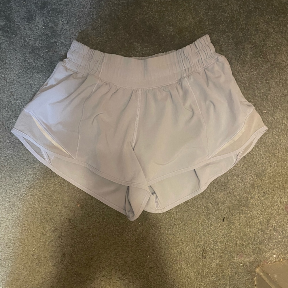 LULULEMON SIZE TWO HOTTY HOT SHORTS. LOWRISE, 2.5 inch. LIGHT BLUE